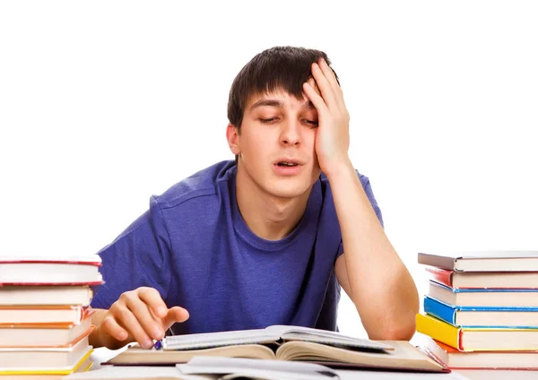 Estudiante cansado con los libros — Foto de Stock