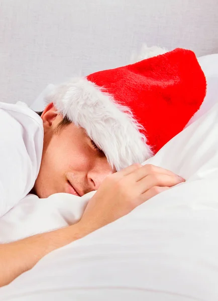 Hombre dormir en Santa Sombrero — Foto de Stock