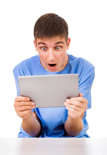 Překvapený muž s tabletem — Stock fotografie