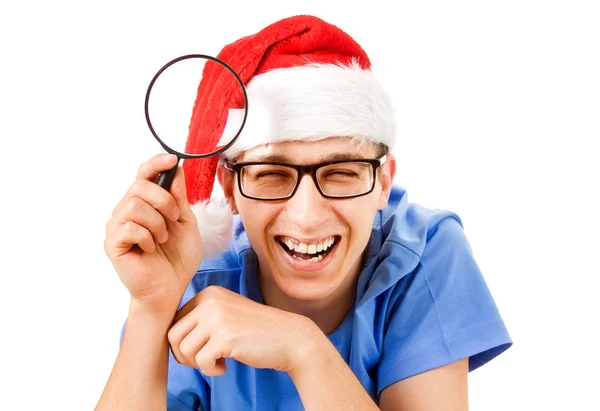 Jeune homme au chapeau de Père Noël — Photo