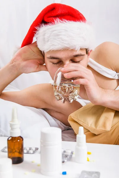 Doente Jovem em Santa Hat — Fotografia de Stock