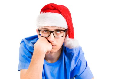 Üzgün Genç Santa Hat portresi Beyaz Arkaplan yakın çekim