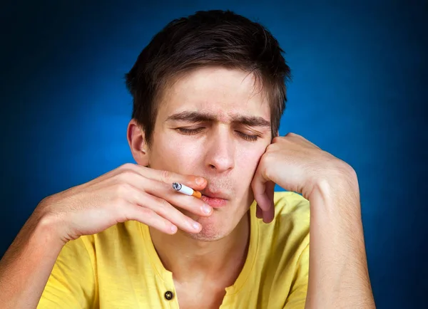 Young Man Cigarette Blue Background Closeup — Stock Photo, Image