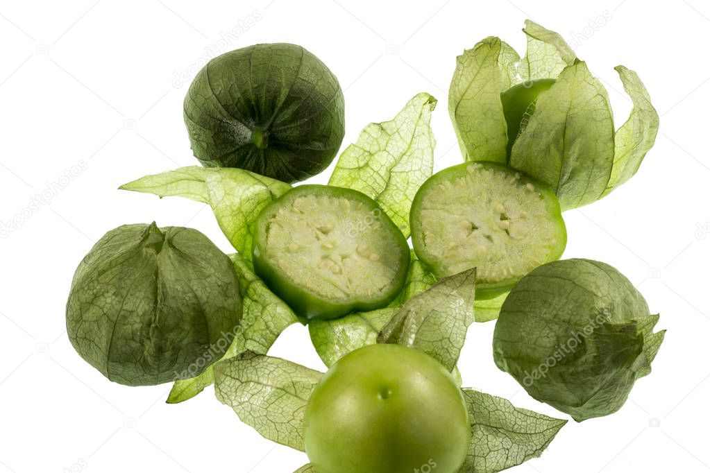 The Tomatillo or Mexican Husk Tomato, Physalis philadelphica, originated in Mexico and are a staple of Mexican cuisine, eaten raw or cooked, particularly in salsa verde