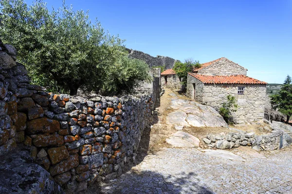 View of the traditional houses built in the locally abundant granite stone, in the medieval village of Sortelha, Portugal