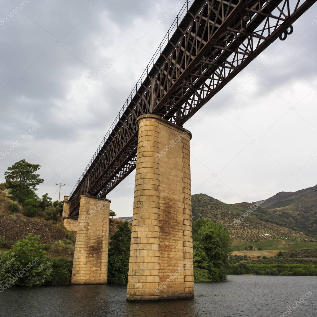 View of the international railway bridge over the Agueda River, connecting Portugal to Spain and now deactivated since 1985, in Barca de Alva, near the Spanish border, Portugal