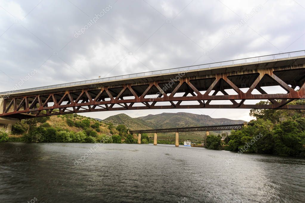 The two bridges, railway and road, over the Agueda River, near the town of Barca de Alva between Portugal and Spain