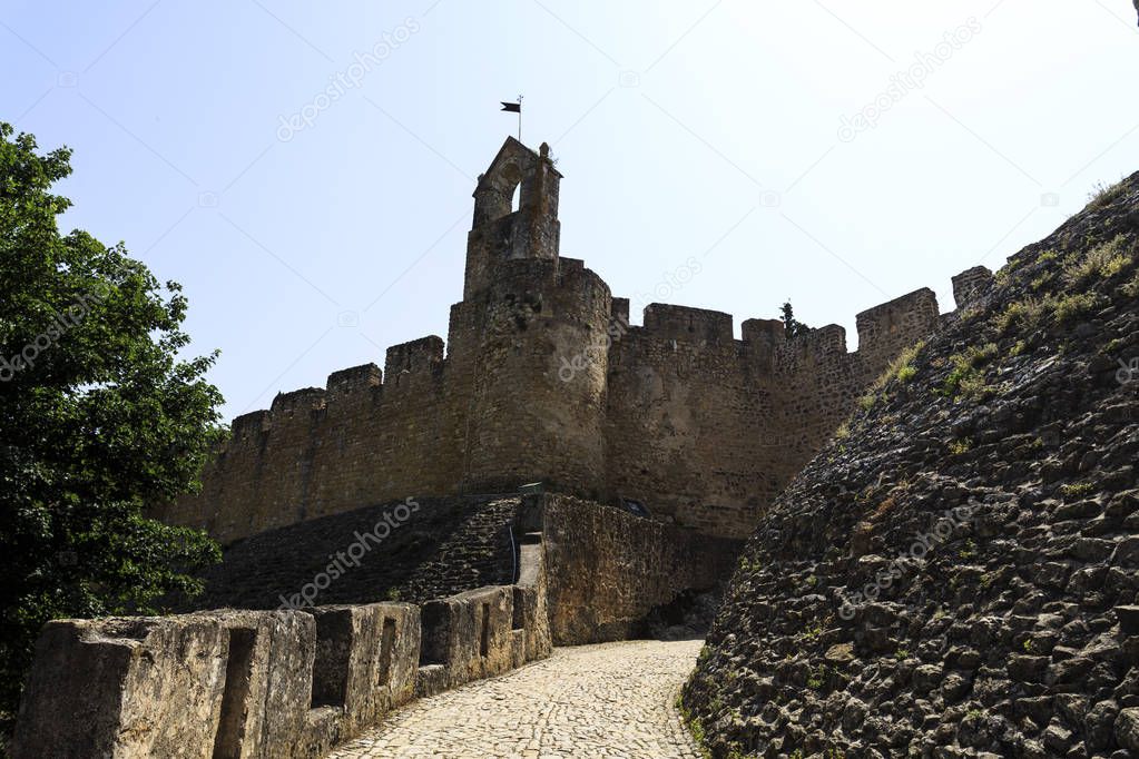 Alley leading to the main entrance of the Templar Castle in Tomar, Portugal