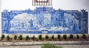 Historic tile panel depicting the crusaders besieging the St George Castle, in Lisbon, on July 16, 2018 in Lisbon, Portugal clipart