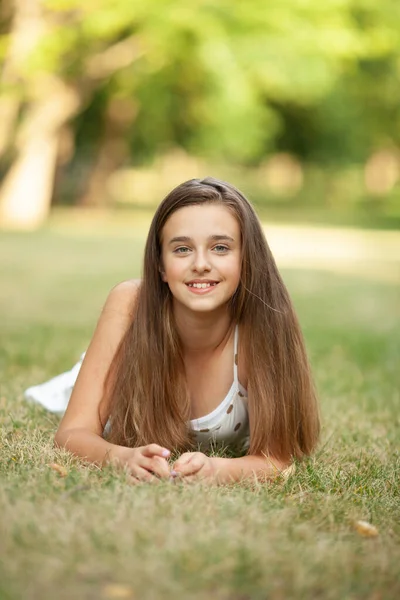 Girl Summer Dress Polka Dots Lies Grass — Stock Photo, Image