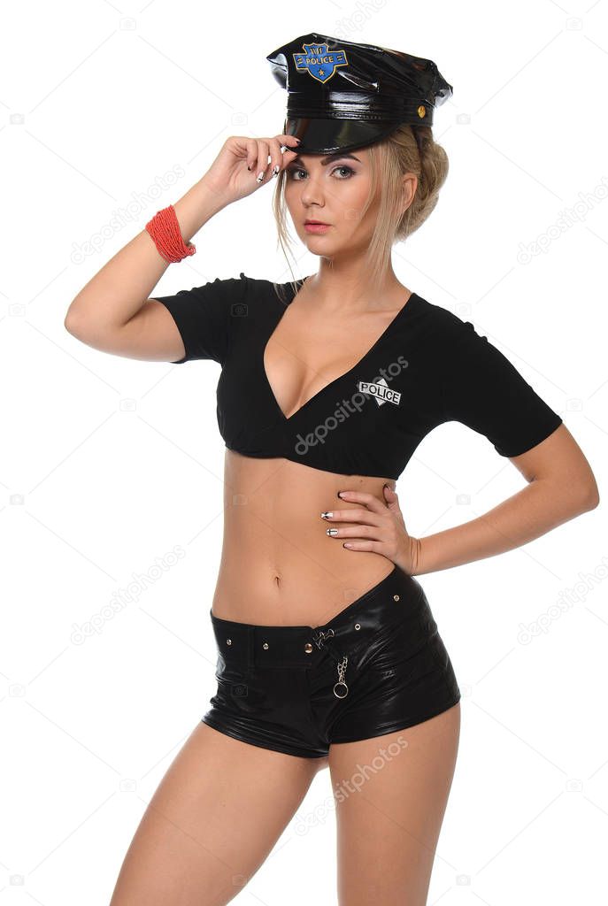 Fashion young woman in clothes policeman on white background 