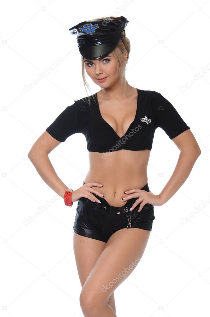 Fashion shoot of young sexy woman in clothes policeman