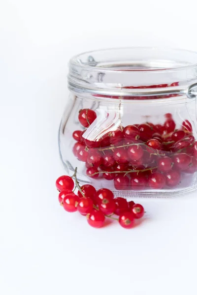 Red Berries Glass Jar Stock Image