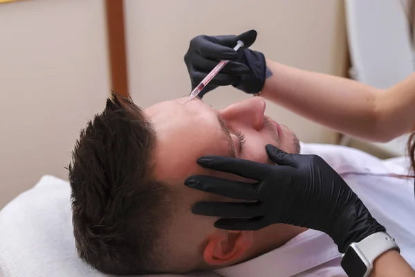 Portrait of a men, having a face mesotherapy on beauty clinic. — Stock Photo, Image
