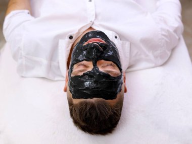 Spa terapi yüz siyah maske almak erkekler için.