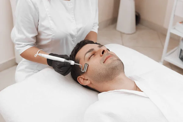 The device is facial cosmetology. — Stock Photo, Image