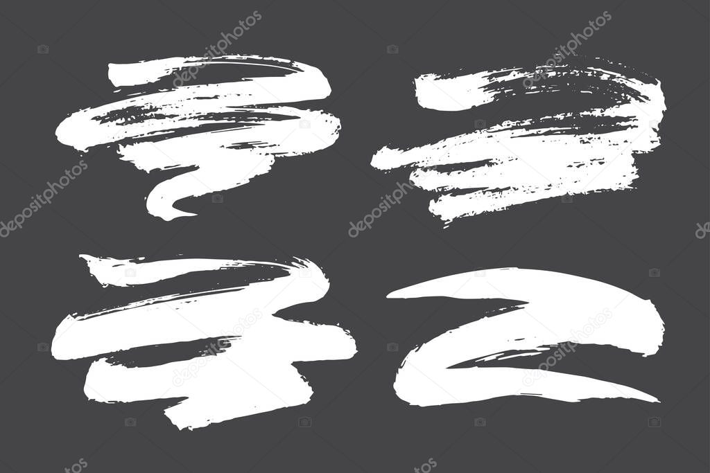 Collection of rough grunge brush strokes in white isolated over dark grey background. Set of design elements. Vector illustration.