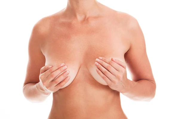 Naken Kvinna Täcker Brösten Genom Händerna Isolerad Vit Bakgrund — Stockfoto