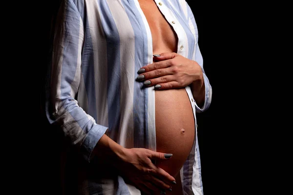 Closeup Shot Belly Pregnant Woman Isolated Black Background Stock Photo