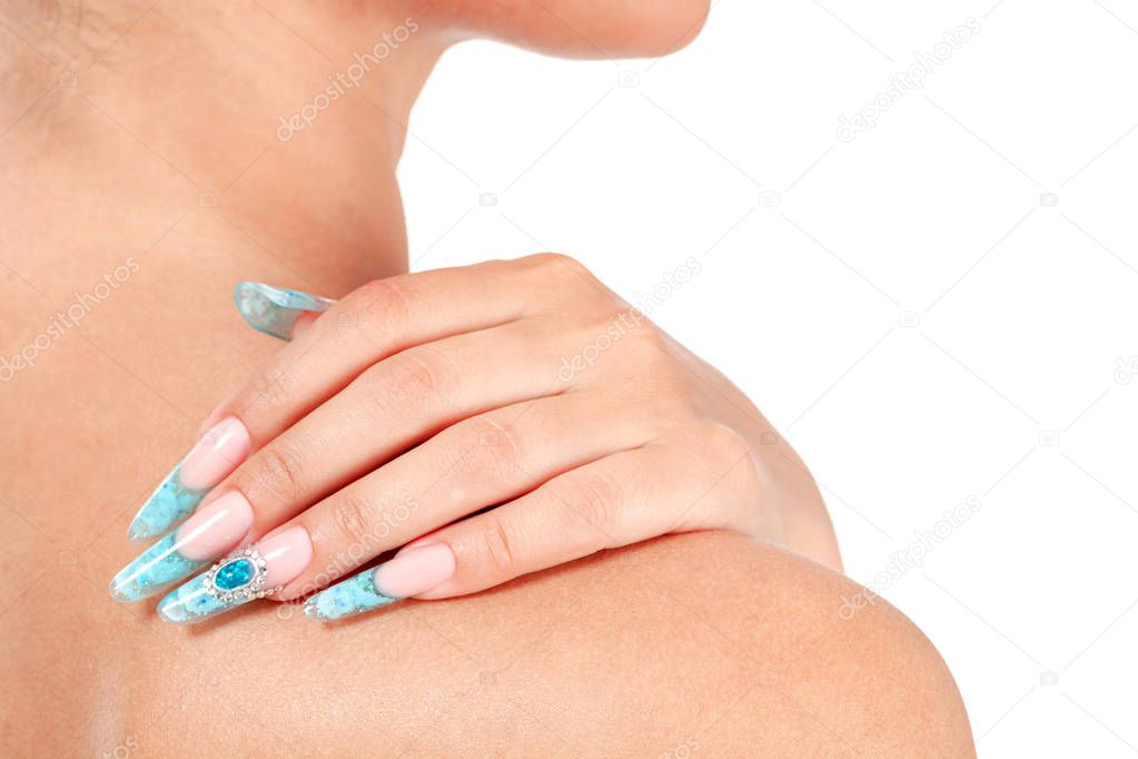 Female hand with long fingernails. Nail art concept