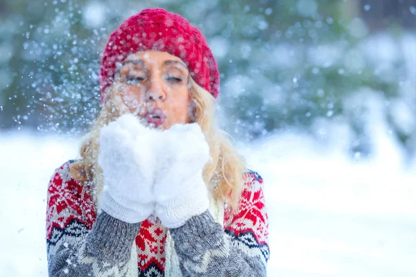 Closeup Shot Blonde Woman Who Blows Snowflakes Her Hands Winter Stock Image