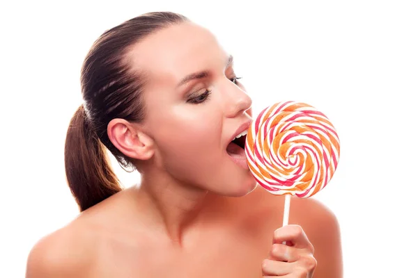 Pretty woman with big lollypop, isolated on white background — Stock Photo, Image