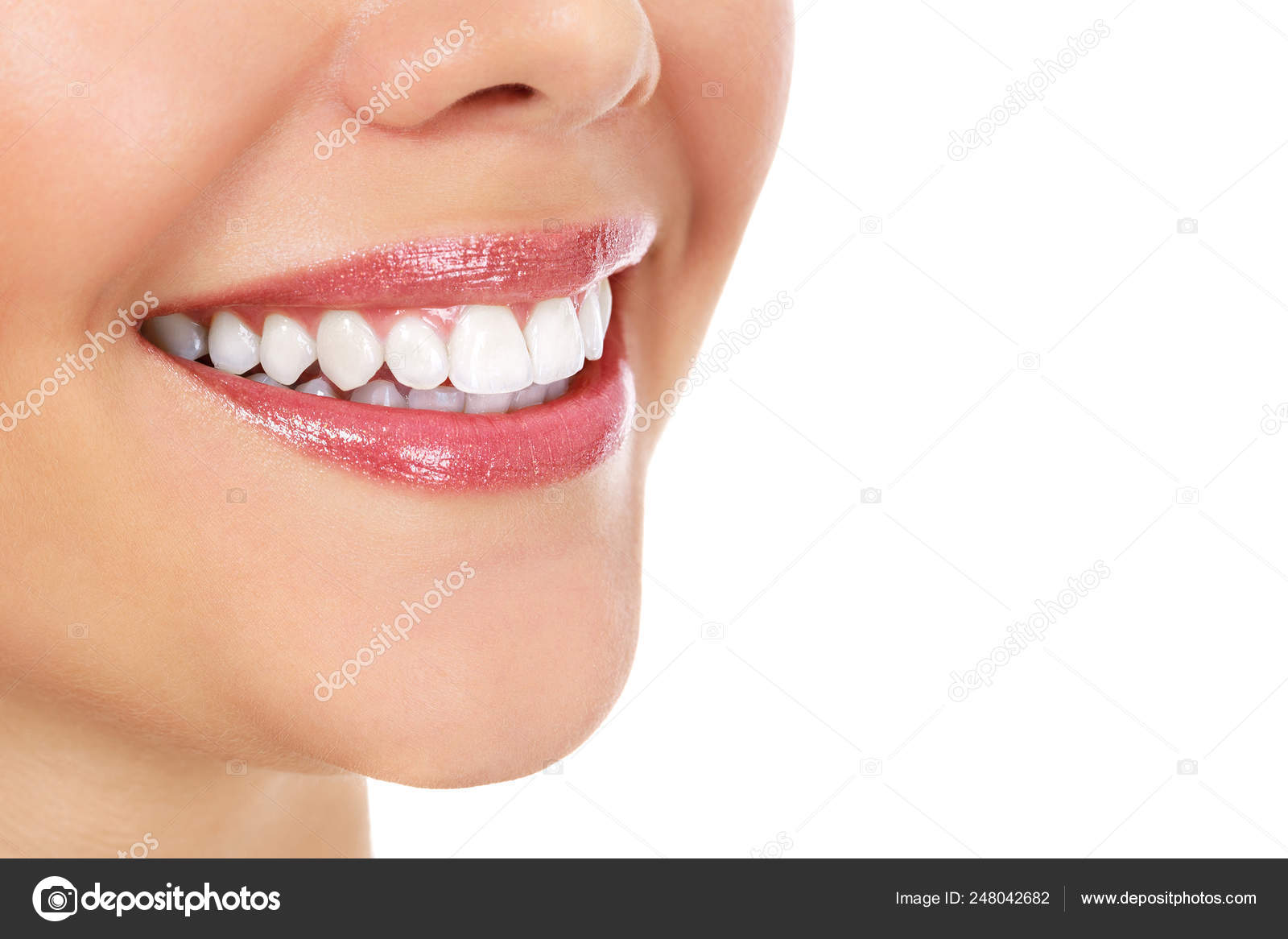 Pretty female smile, closeup shot, isolated on white background Stock Photo  by ©Nobilior 248042682