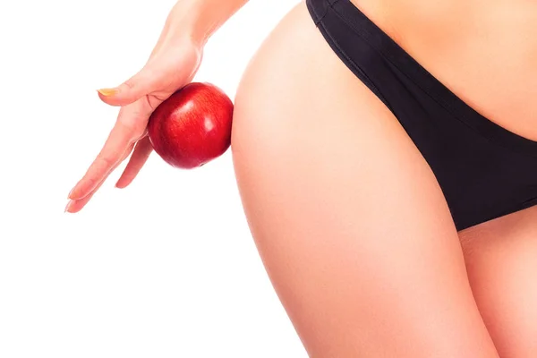 Forme femminili e mela rossa, sfondo bianco, isolato — Foto Stock