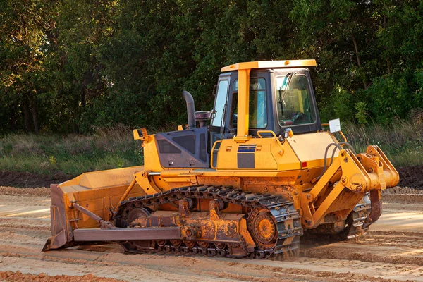 Bulldozer in action on a construction site — Stock Photo, Image
