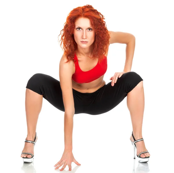 Beautiful slim woman in sports outfit posing on white background — Stock Photo, Image