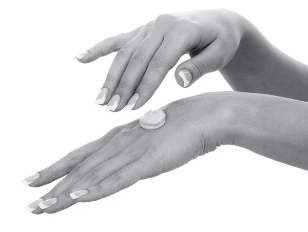 Mãos Mulher Com Manicure Perfeita Aplicando Creme Hidratante Isolado Fundo — Fotografia de Stock