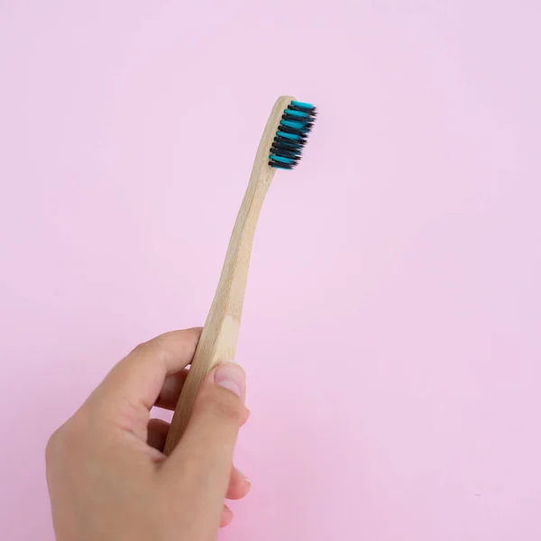 Bamboo Tooth Brush Hand Background — Stock Photo, Image