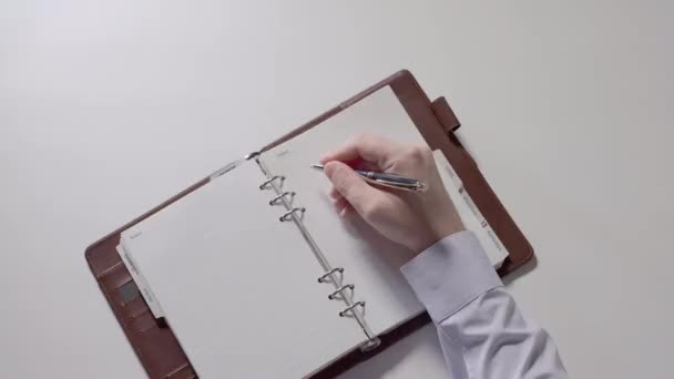 Man Preparing Writing Notes Spiral Notebook Man Hand Shirt Closeup — Stock Video