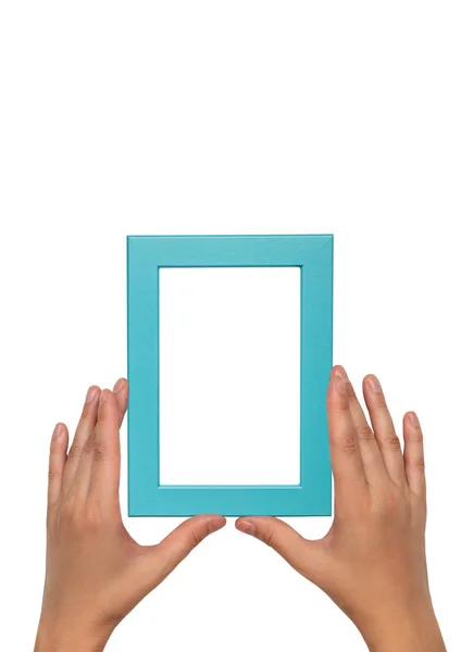 Moldura de foto azul em mãos femininas. Modelo de quadro vazio . — Fotografia de Stock