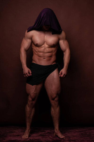 Fitness male model in studio