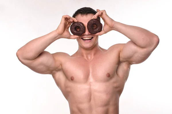 Fitness Modelo Masculino Ieating Donut — Fotografia de Stock