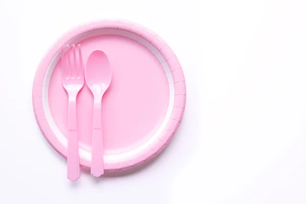 Rosa färg papper plattan med sked och gaffel — Stockfoto
