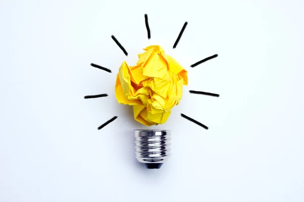 Great idea concept with crumpled yellow paper light bulb — Stock Photo, Image