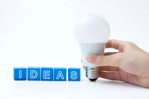 Ideas word with light bulb — Stock Photo, Image