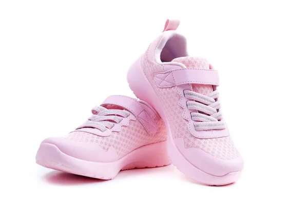 Ροζ παπούτσια που τρέχουν χωρίς σήμα σε λευκό φόντο — Φωτογραφία Αρχείου