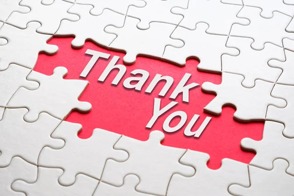 Thank you word reveal under jigsaw puzzle — Stock Photo, Image