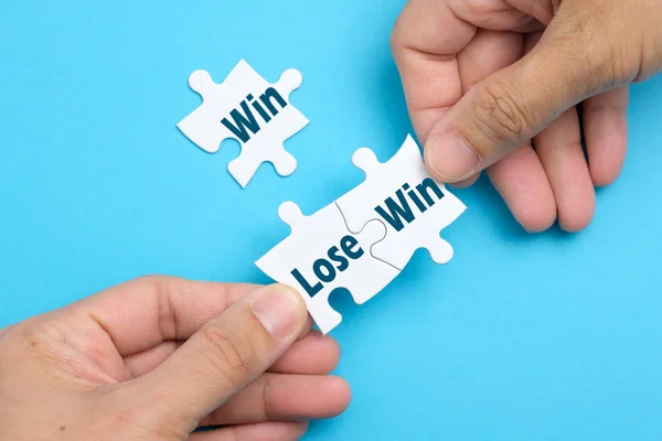 Win lose situation on white puzzle — Stock Photo, Image