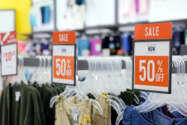 Red sale sign in store — Stock Photo, Image