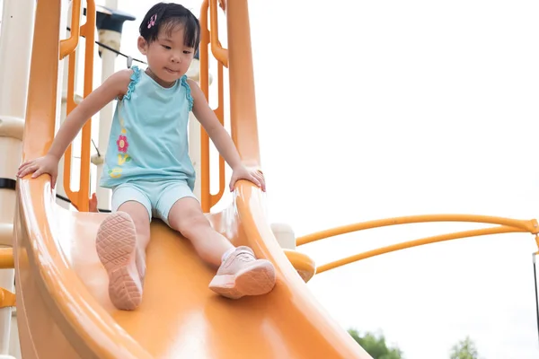 Active little toddler girl on the playground — Stock Photo, Image