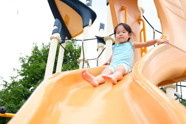 Active little toddler girl on the playground — Stock Photo, Image