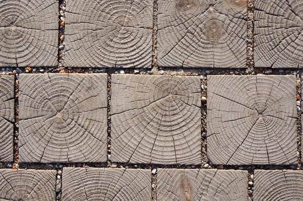 Wooden blocks pavement texture. Natural background.