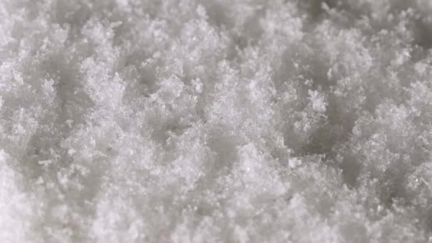 地面に落ちてくる雪の結晶 — ストック動画