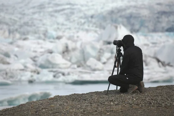 Fotograf med stativ - Stock-foto