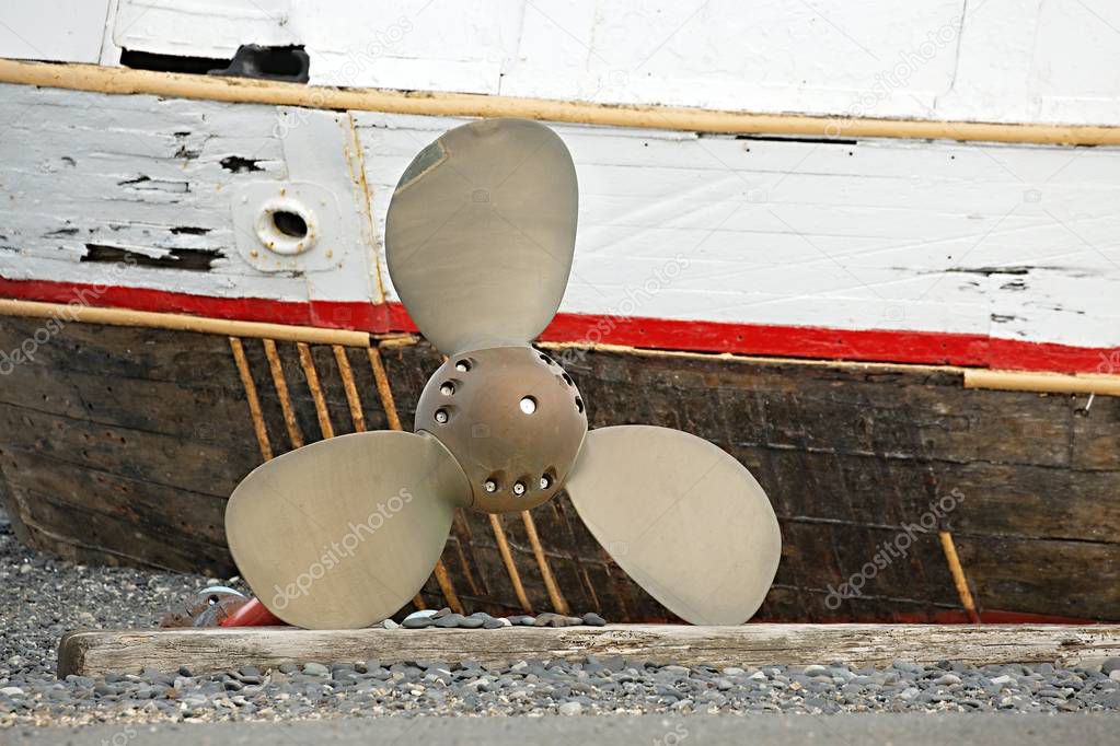 Ship propeller on shore