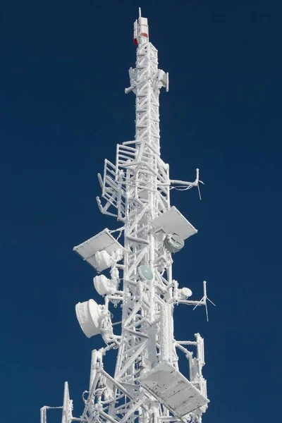 Transmitter tower frozen in winter frost — Stock Photo, Image